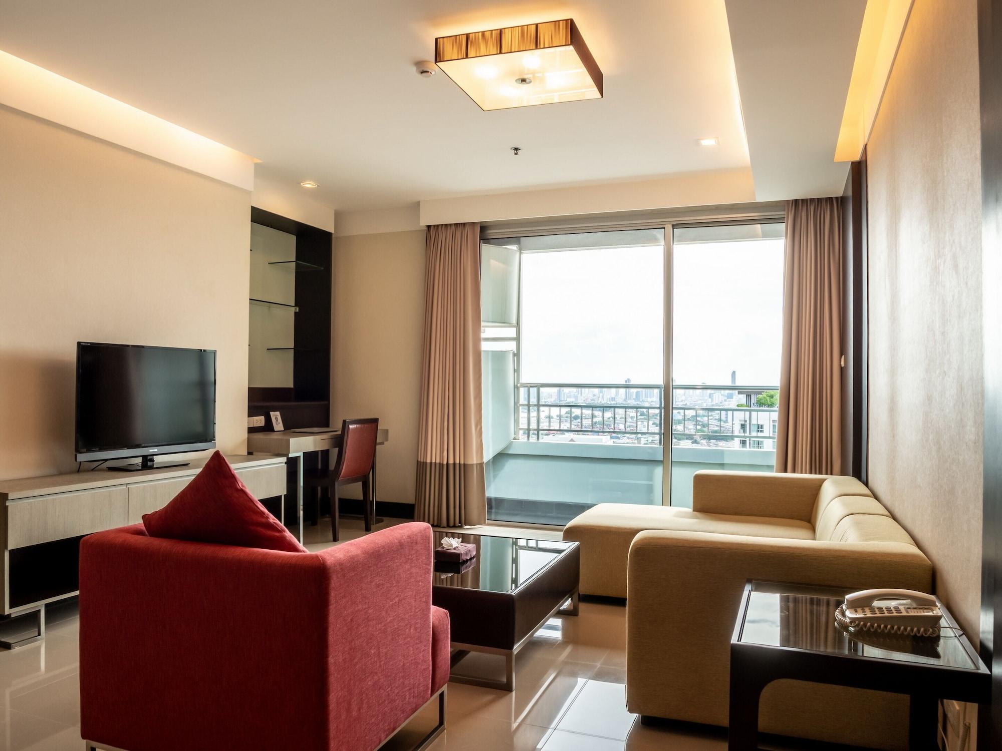 Jasmine Grande Residence Бангкок Екстер'єр фото A living room in a condominium
